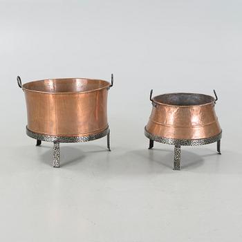 Two 19th century copper cauldrons.