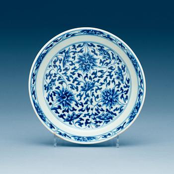 1956. A Chinese blue and white lotus dish, Republic with Kangxi six character mark.