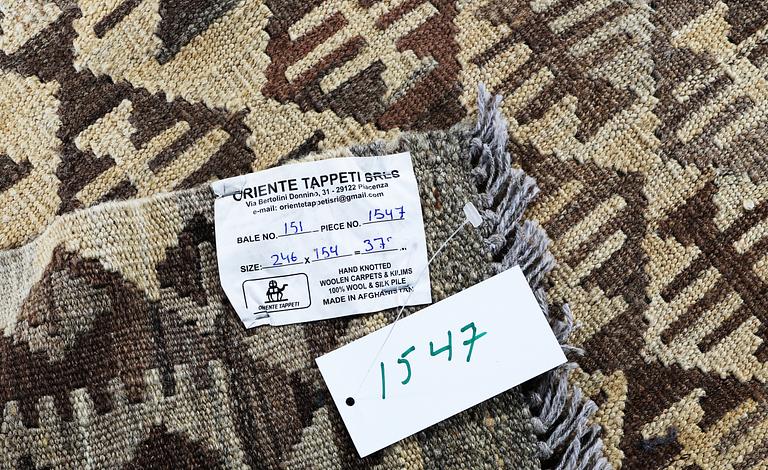 A rug, kilim, ca 246 x 154 cm.