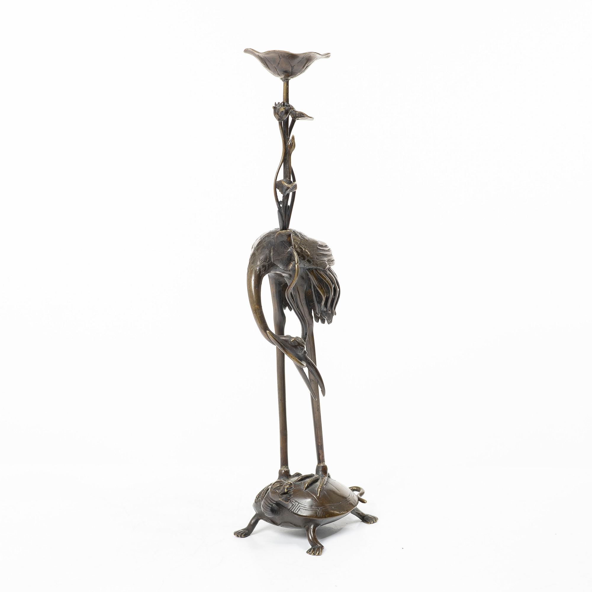 A bronze candle holder, Japan, 20th century.