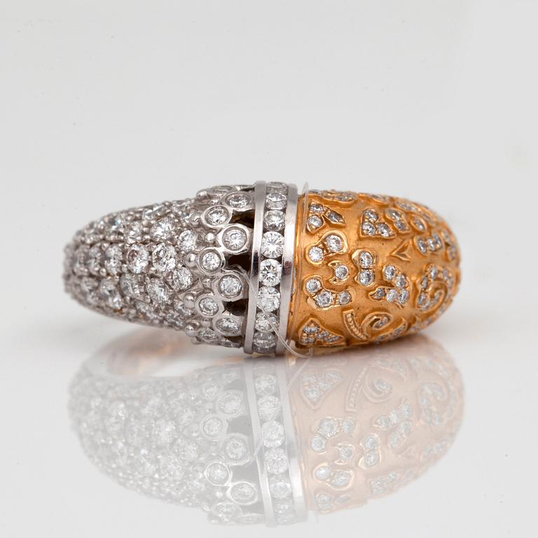 A pair of Carrera Y Carrera brilliant-cut diamond earrings and a ring.