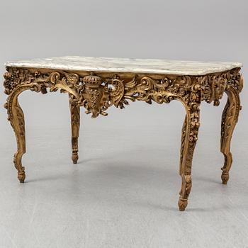 A second half of the 20th Century bronzed table with a marble top.