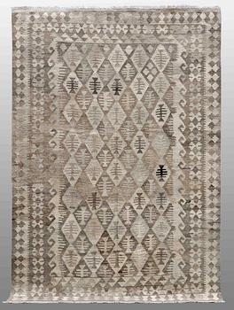 A Kilim carpet, ca 250 x 174 cm.