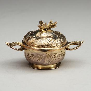 A German 18th century silver-gilt toilette-box, makers mark of Johan Martin Sratzger, Augsburg 1763-1765.