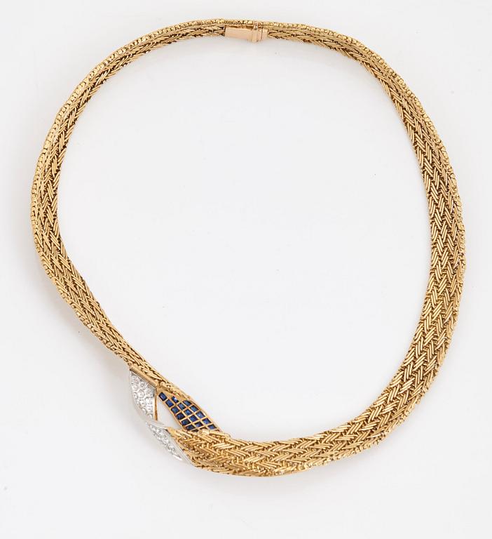 A necklace set with round- brilliant cut diamonds and step cut sapphires.