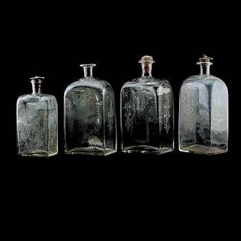 BRÄNNVINSFLASKOR, 4 st, glas, 1800-talets mitt.