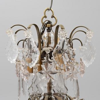 A Rococo style chandelier, early 20th century.