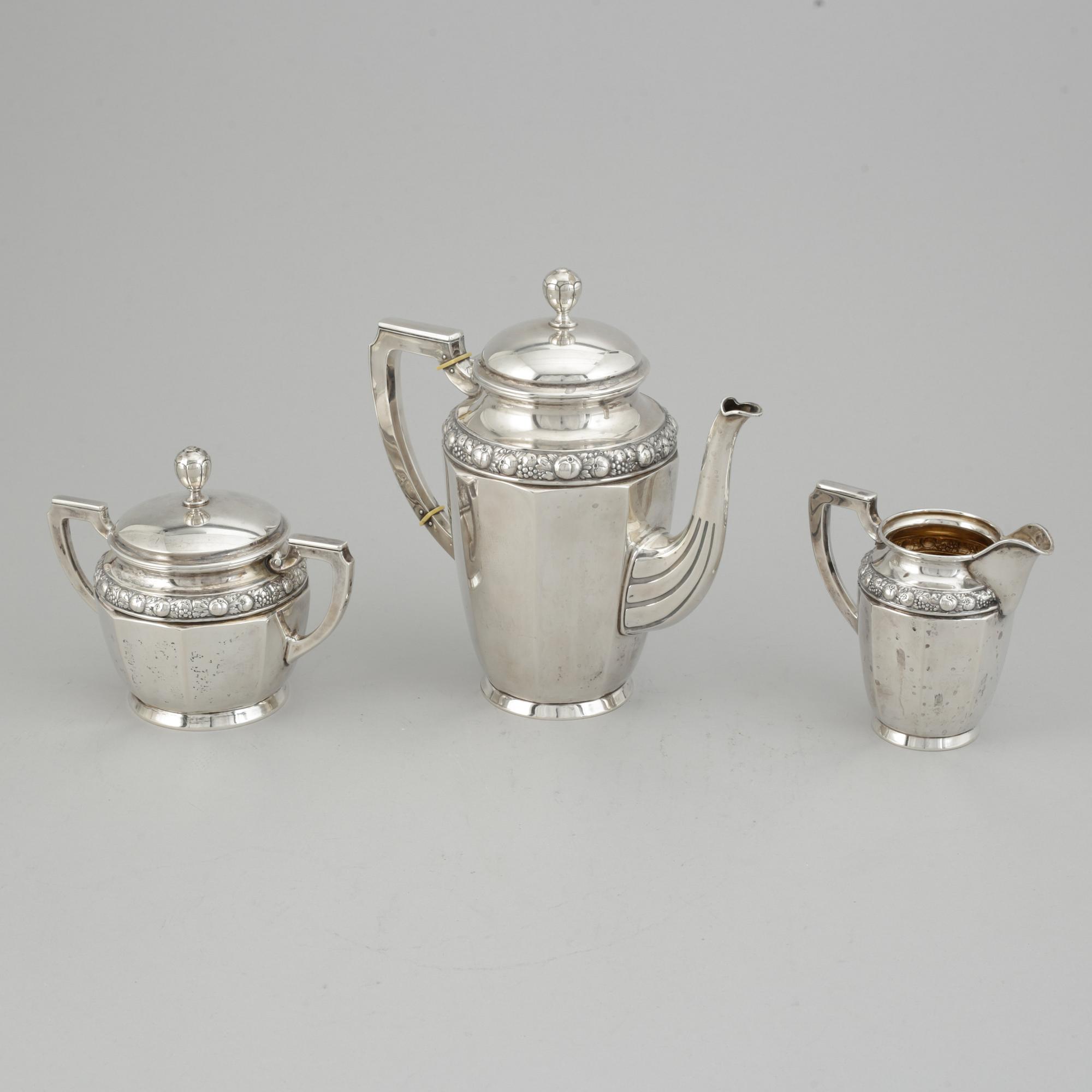 A three pieces silver coffee service from CG Hallberg, Stockholm 1916.