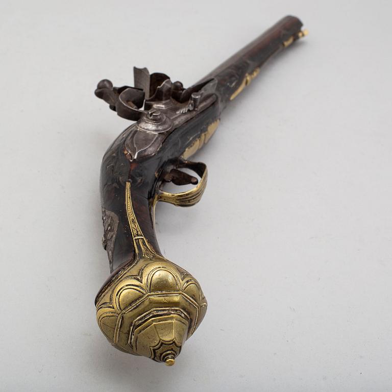 An 18th century  flintlock pistol for the oriental market.