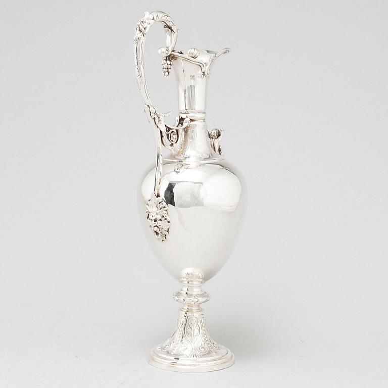 An English 19th century silver wine-jug, mark of Joseph Angle, London 1860.