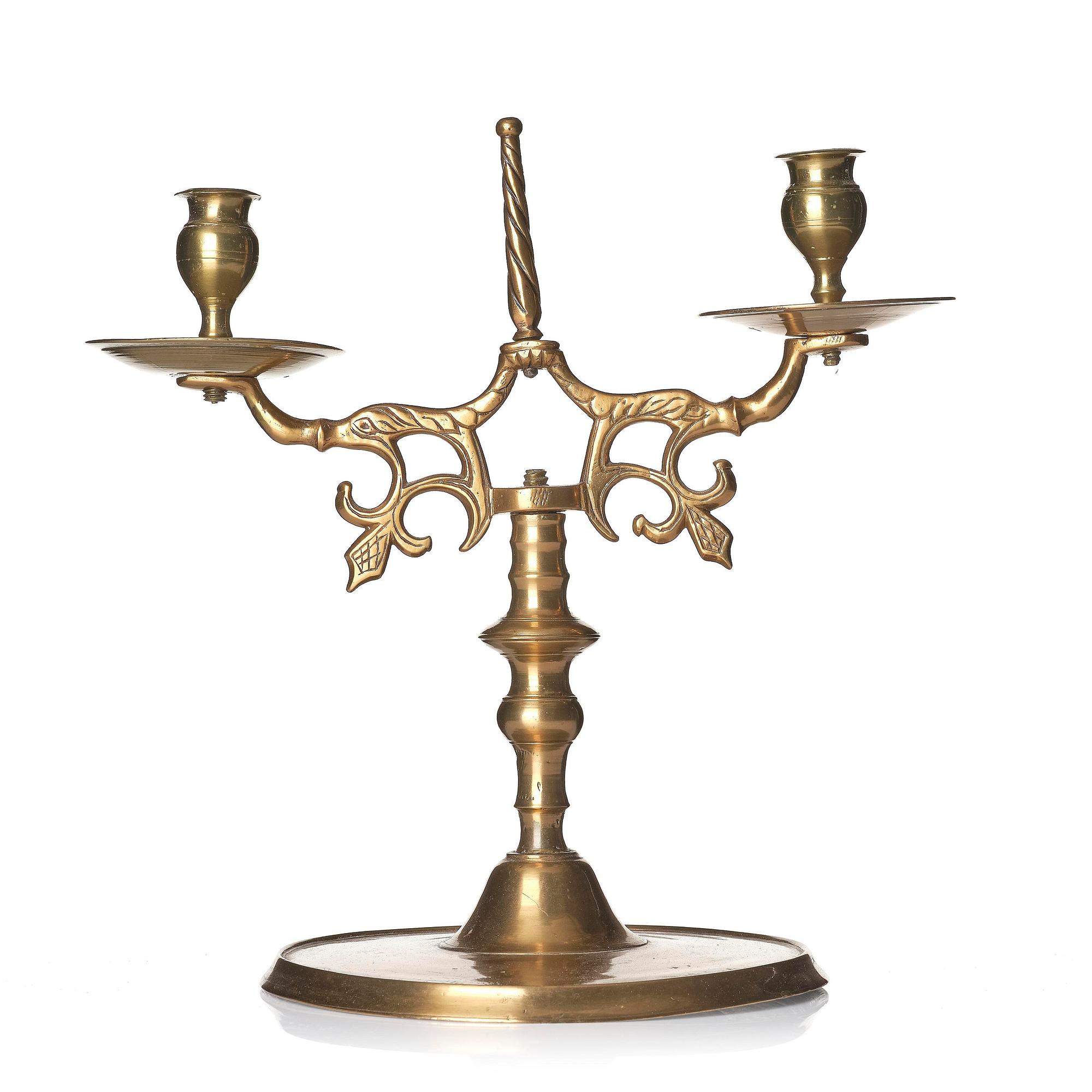 A baroque brass two-branch candelabra, Northern Europe/Sweden, 17th century.