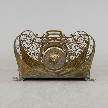 A French late 19th century brass firewood rack / fireplace log holder.