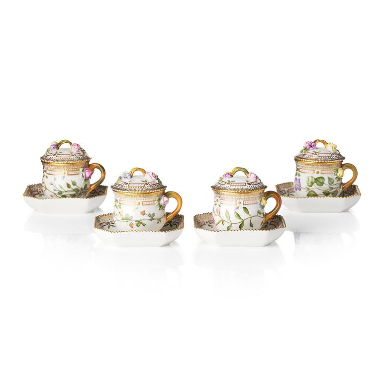A set with four Royal Copenhagen 'Flora Danica' custard cups with covers and stands, Denmark, 20th century.
