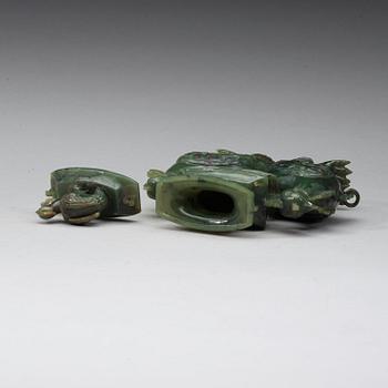 A moss green jade double fenix figurine, 20th century.