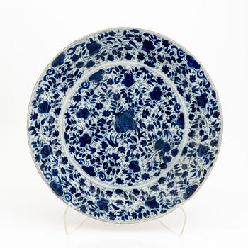 A Persian 17th/18th blue and white faience dish.