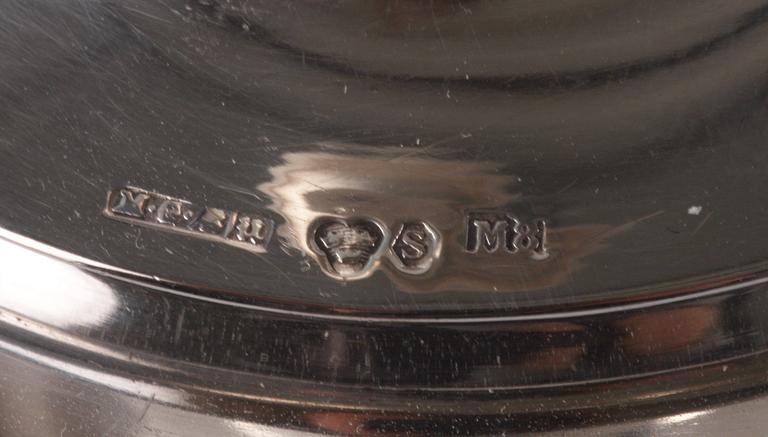 LJUSSTAKAR, ett par, silver, 1938.