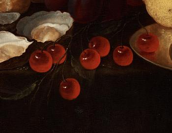 Jan van den Hecke d.ä, Still life with a silver beaker, oysters, pomegranate, cherries and grapes.