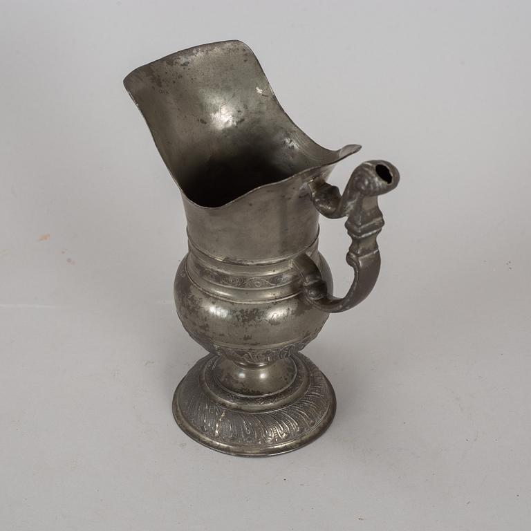 A pewter jug, probably 17th century.