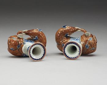 A pair of Export candle sticks in the shape of reclining elephants, Qing dynasty, Qianlong (1736-95).