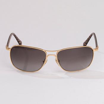 SOLGLASÖGON, Louis Vuitton.