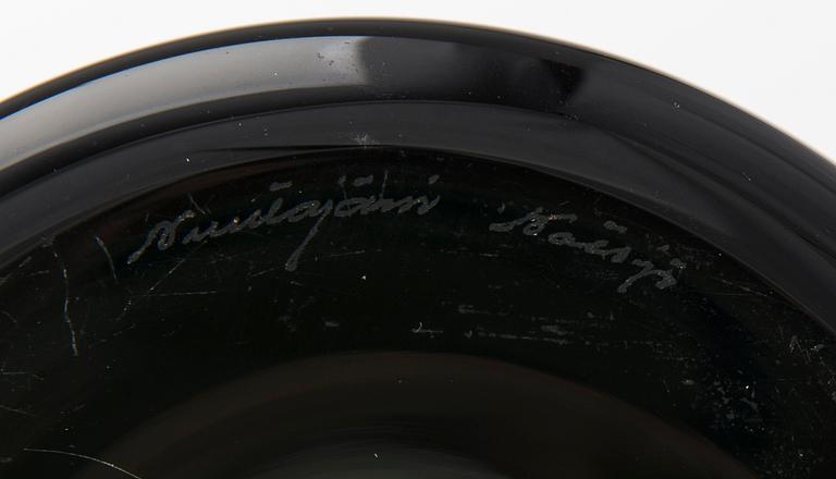 A candlestick signed Nuutajärvi Notsjö.