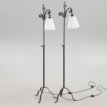 Harald Notini, a pair of wrought iron floor lamps, model '15101', Arvid Böhlmarks Lampfabrik, 1930's.