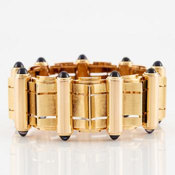 An 18K gold Retro bracelet.