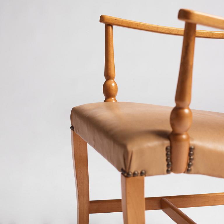 Josef Frank, a pair of mahogany easy chairs, Svenskt Tenn, Sweden 1940-1960s, model 2067.