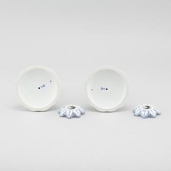 A pair of porcelain candle sticks by Meissen, second half of the 20th century.