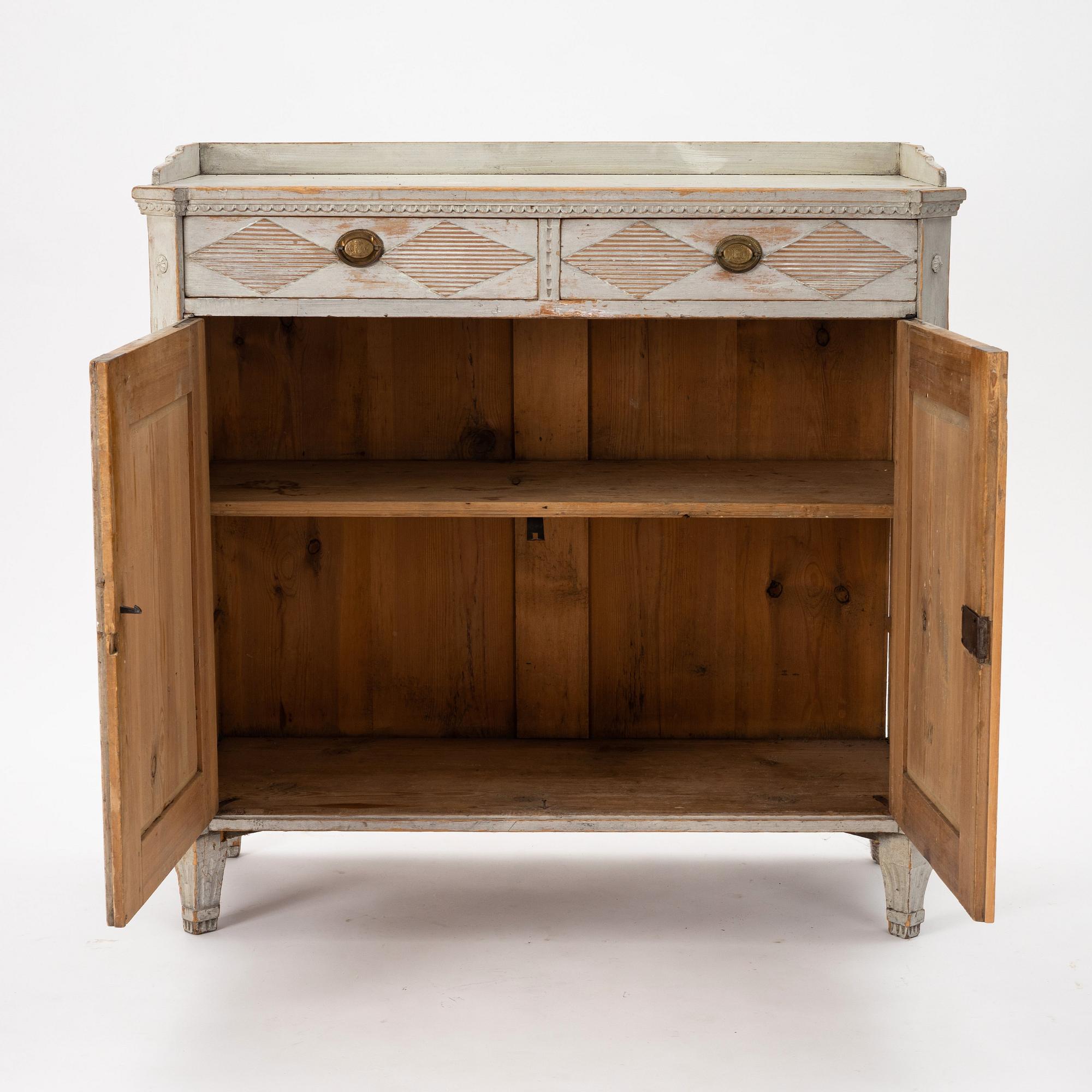A late Gustavian grey lacquered pine cabinet, Sweden ca 1800.
