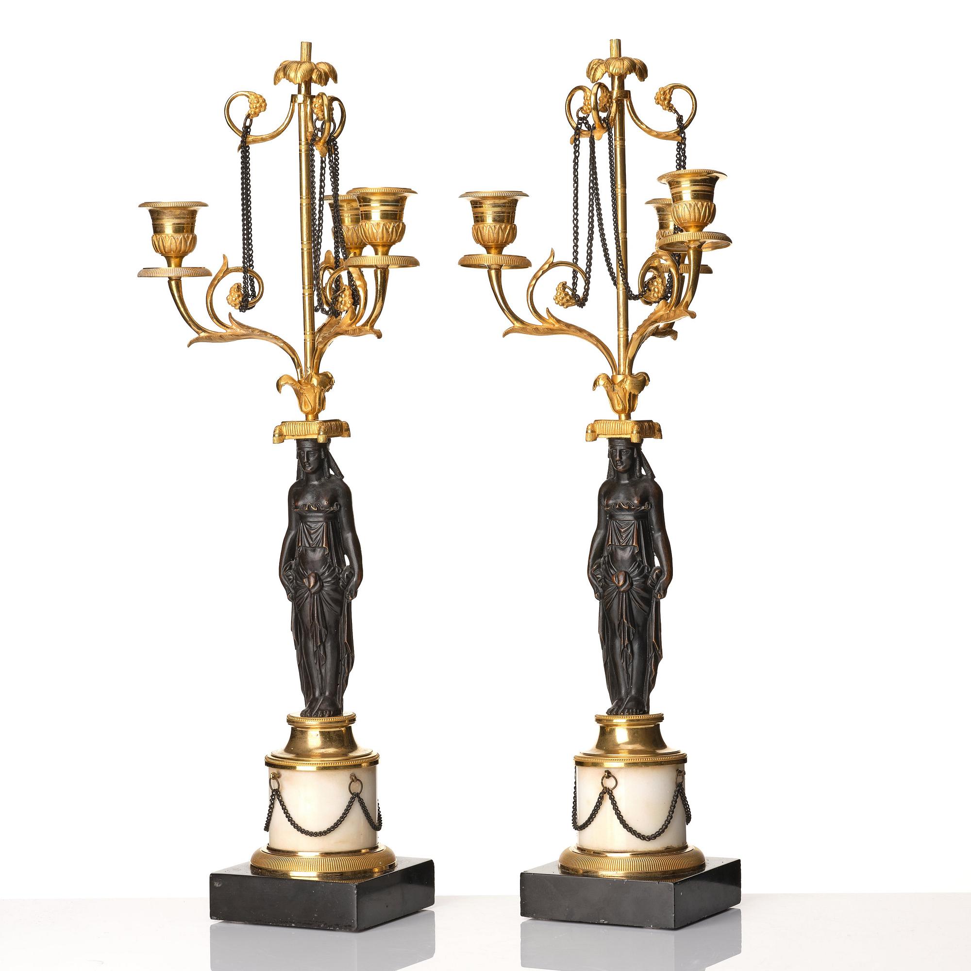 A pair of late Gustavian circa 1800 three-light candelabra, attributed to F L Rung.
