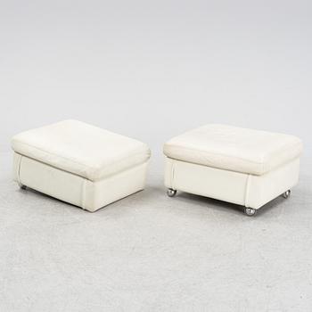 A pair of leather upholstered foot stools, Dux, later part of the 20th Century.