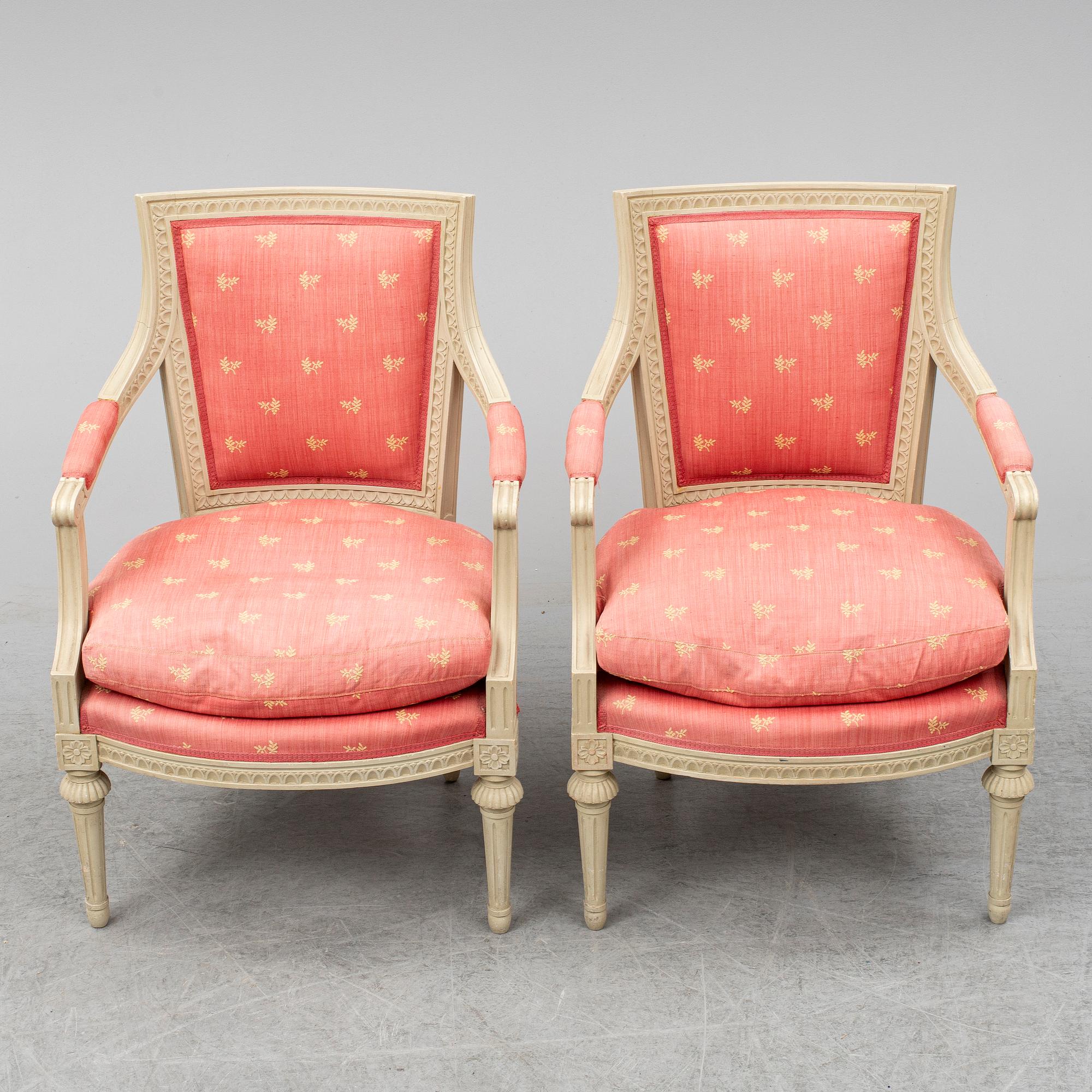 A pair of gustavian style armchairs, second half of the 20th century.