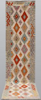 A Kilim runner, approx. 291 x 71 cm.