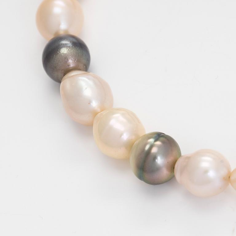 Ole Lynggaard, A cultured pearl necklace, clasp in 18K gold with a round brilliant-cut diamond.