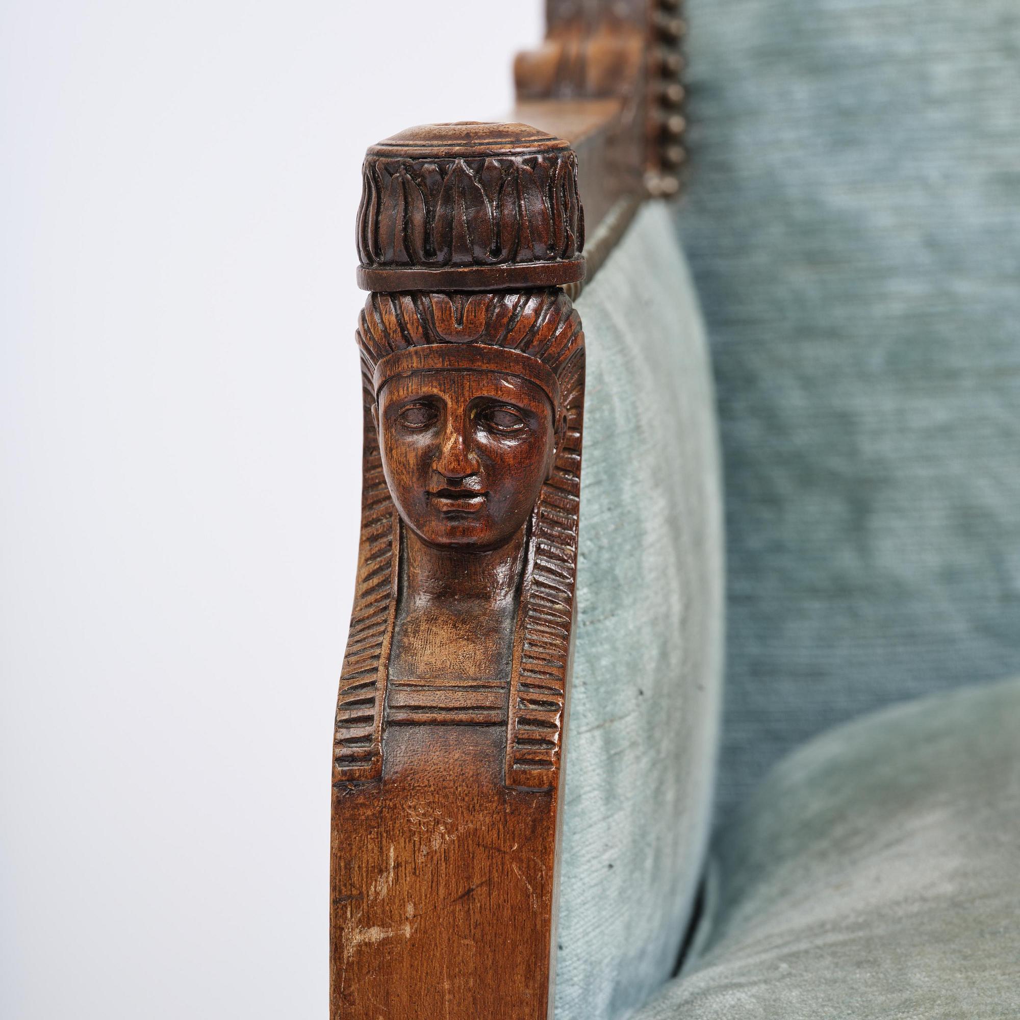 A pair of French Empire mahogny armchairs.