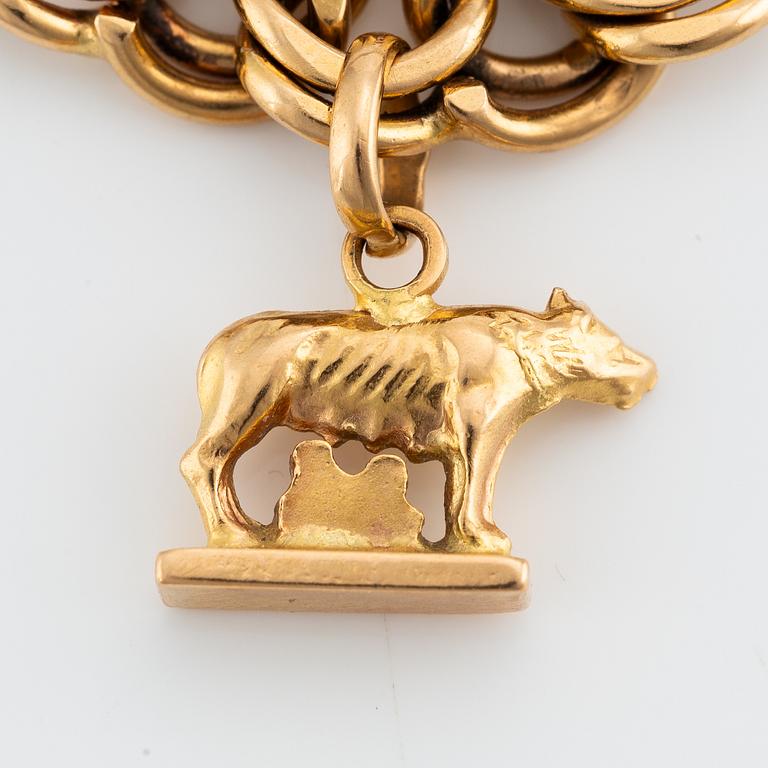 Bracelet with charm 18K gold.
