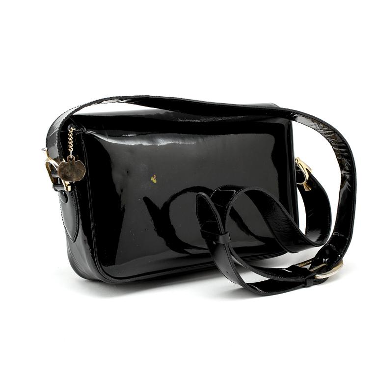 CÉLINE, a black leather patent shoulder bag.