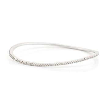 443. An Ole Lynggaard 18K white gold "Love" bangle set with round brilliant-cut diamonds, design Charlotte Lynggaard.