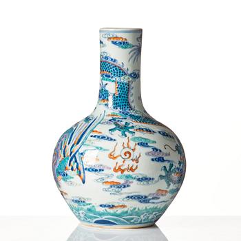 A doucai 'dragon and phoenix' vase, late Qing dynasty with Qianlong mark.