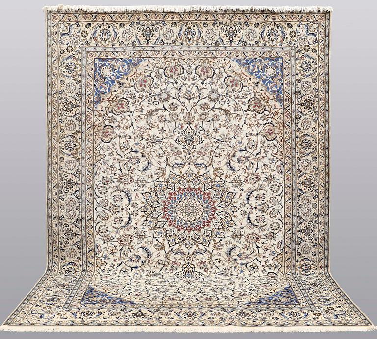 A carpet, Nain part silk, 364 x 256 cm.
