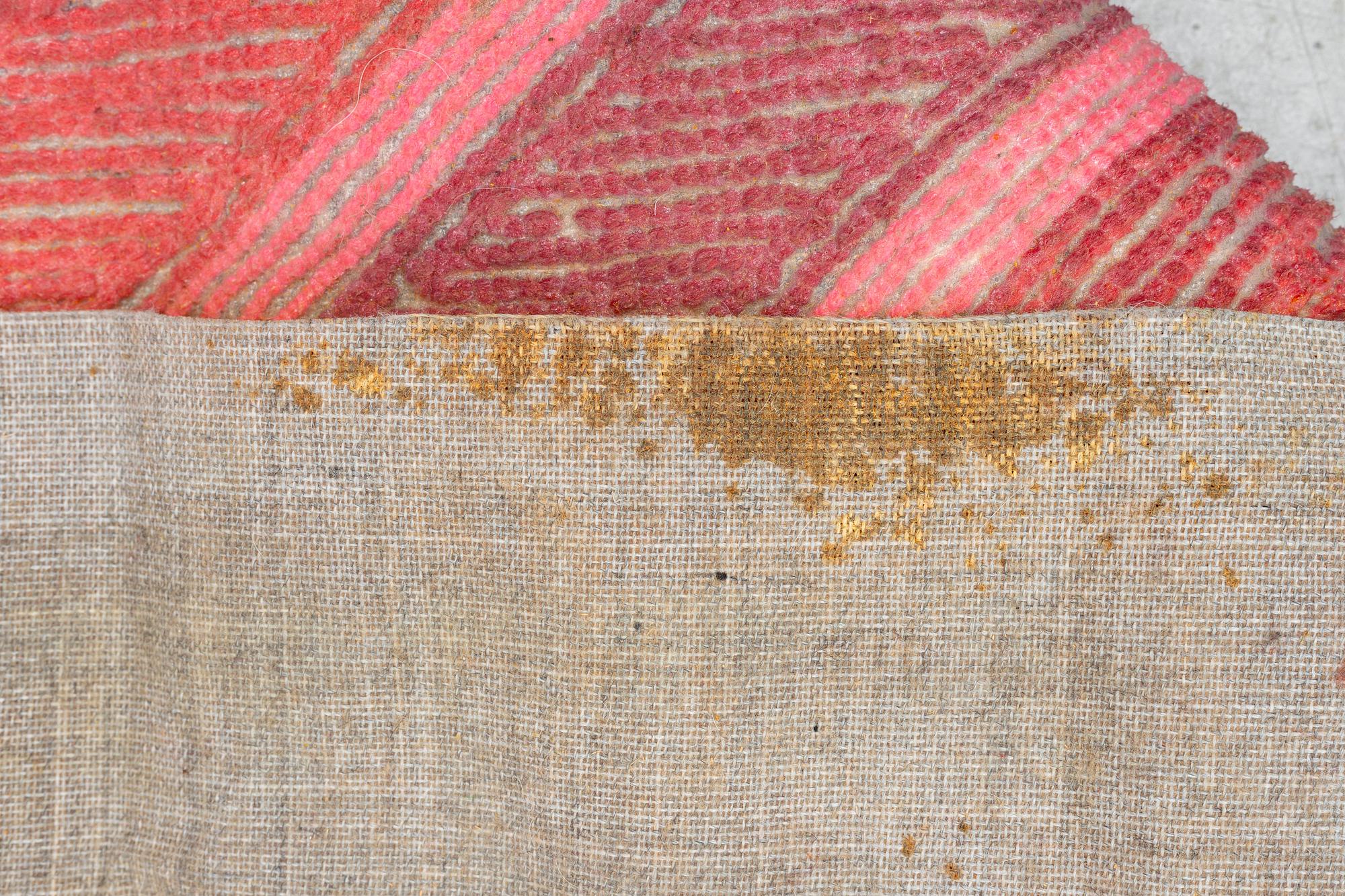 A carpet, 'Océjan', tufted (in relief), Kasthall, Sweden, c. 700 x 170 cm, signed 'JM 83'.