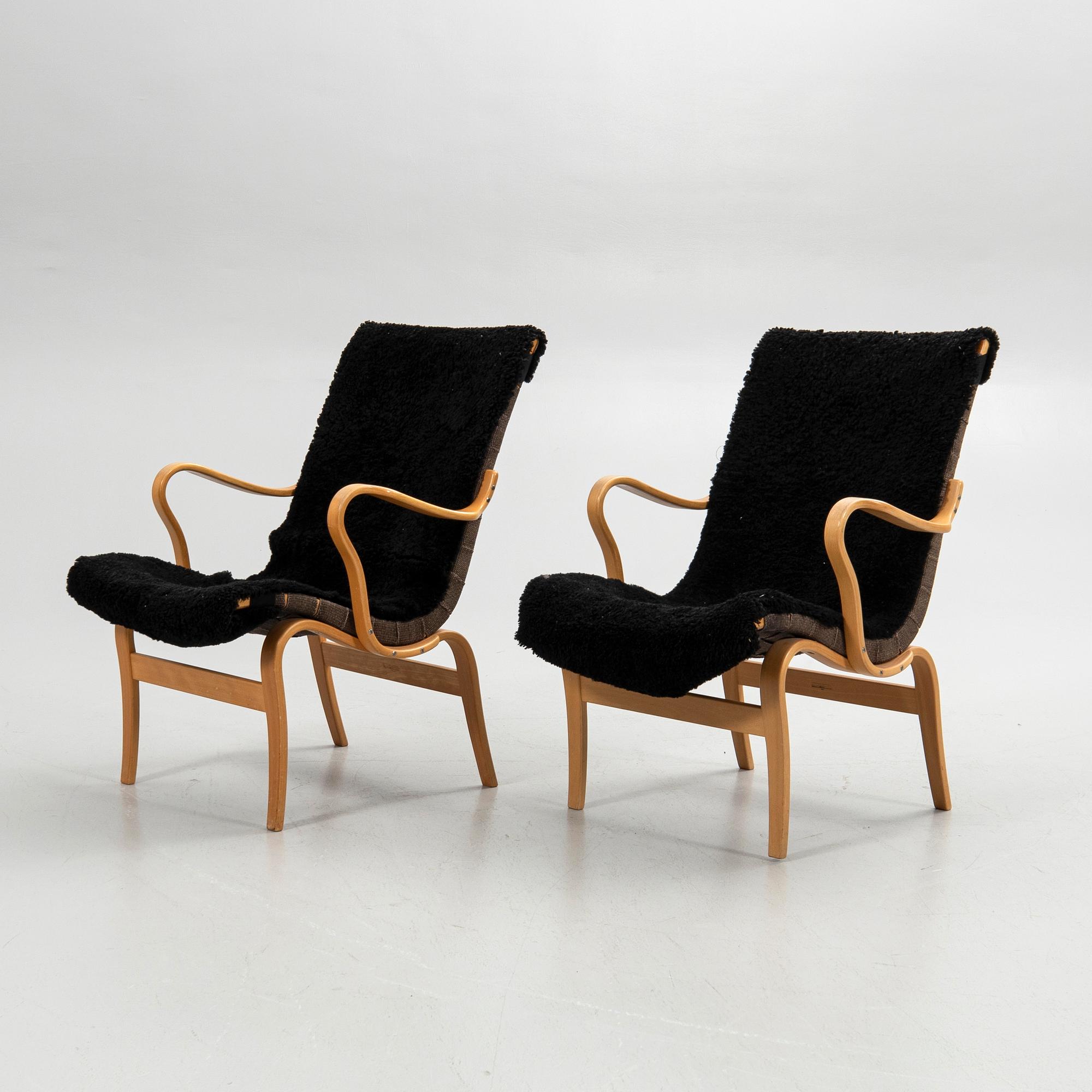Bruno Mathsson, armchairs, a pair, "Eva", Bruno Mathsson International, Värnamo, second half of the 20th century.
