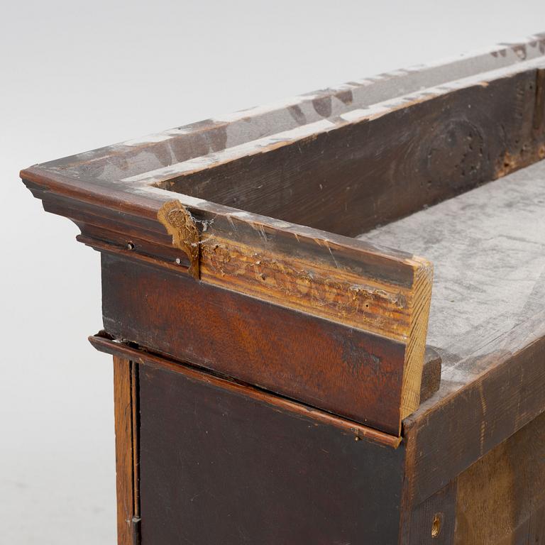 A mahogany veneered vitrine wal cabinet.