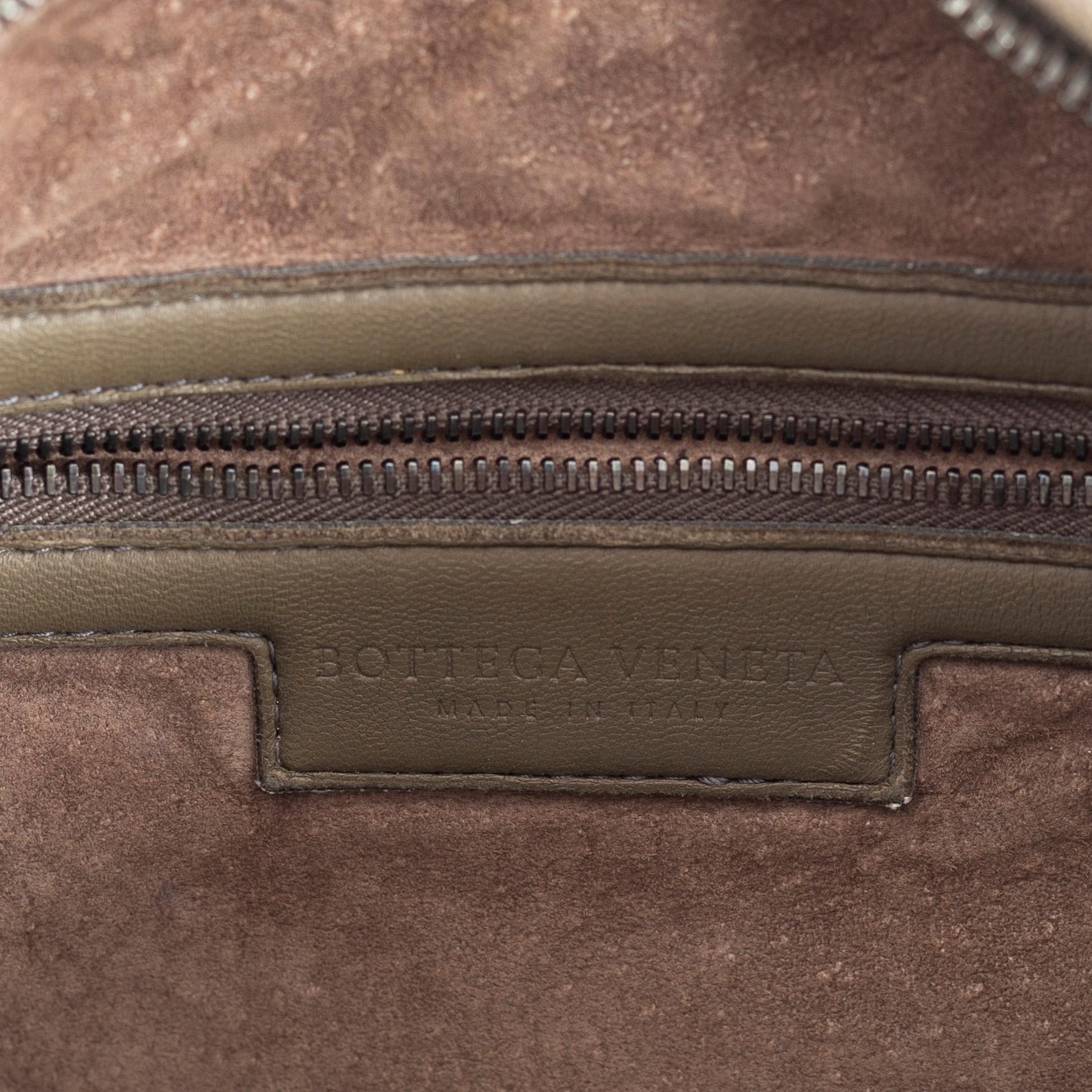 Bottega Veneta, a grey intrecciato leather bag.