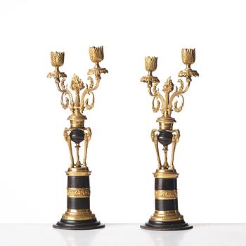 A pair of North European two-light candelabra, circa 1800.