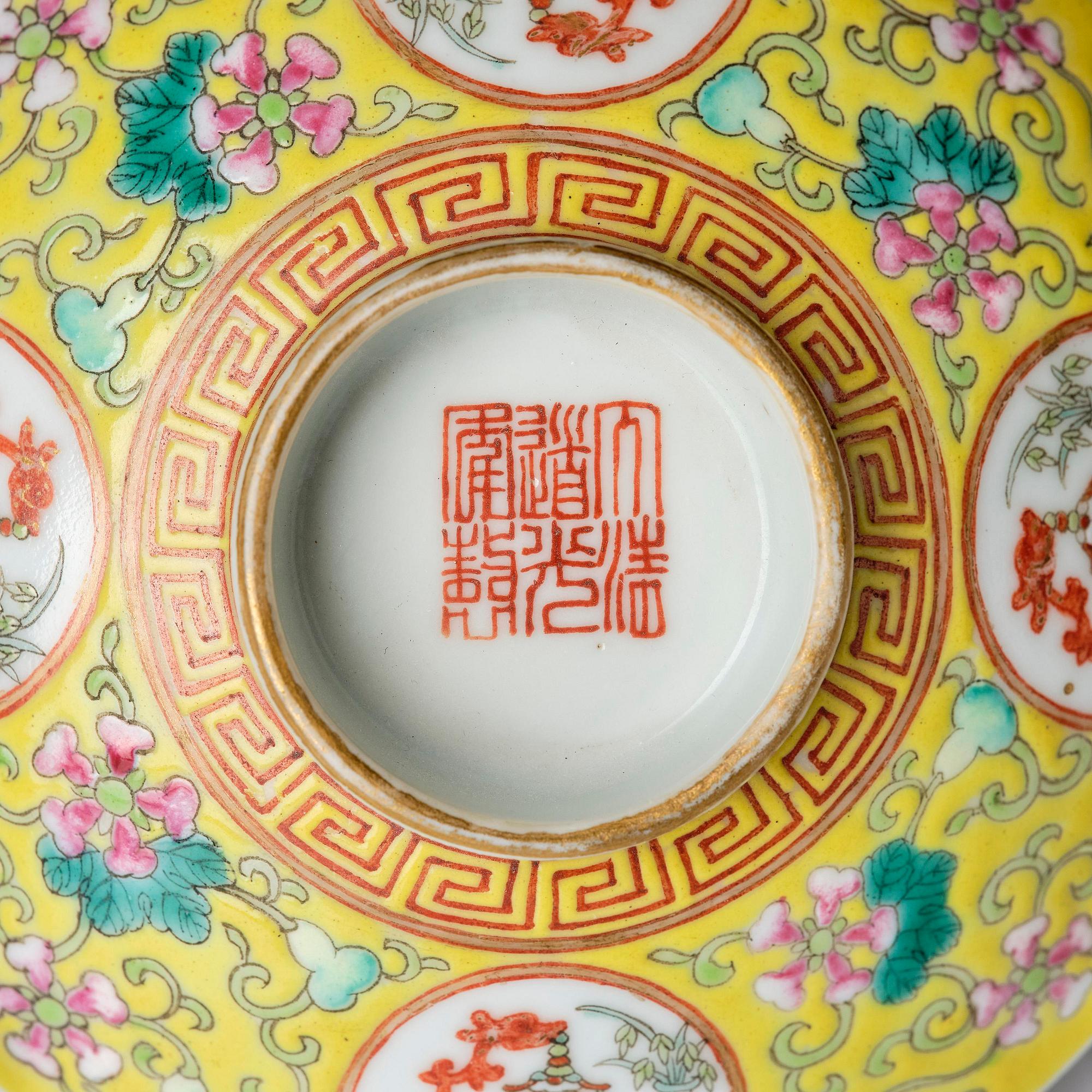 A pair of yellow ground 'medallion' bowls with covers, Qing dynasty with Daoguang mark.