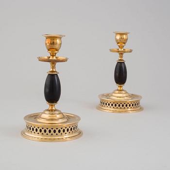 a pair of Skultuna candlesticks from the first half of the 20th century.