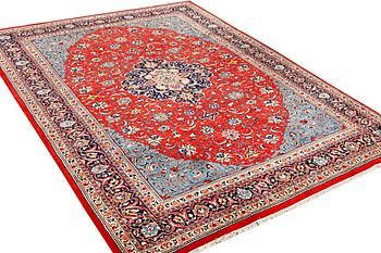 A Kashan carpet, a. 320 x 234 cm.
