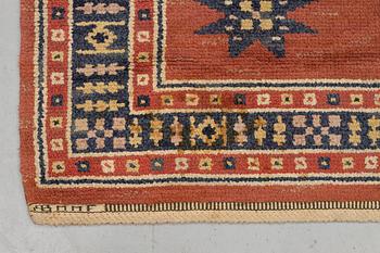 Märta Måås-Fjetterström, a carpet, "Röd Flossa", knotted pile, ca 300 x 272 cm, signed AB MMF.